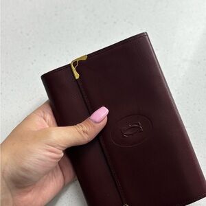 Vintage Cartier Burgundy Leather Bifold Wallet with Gold Accents